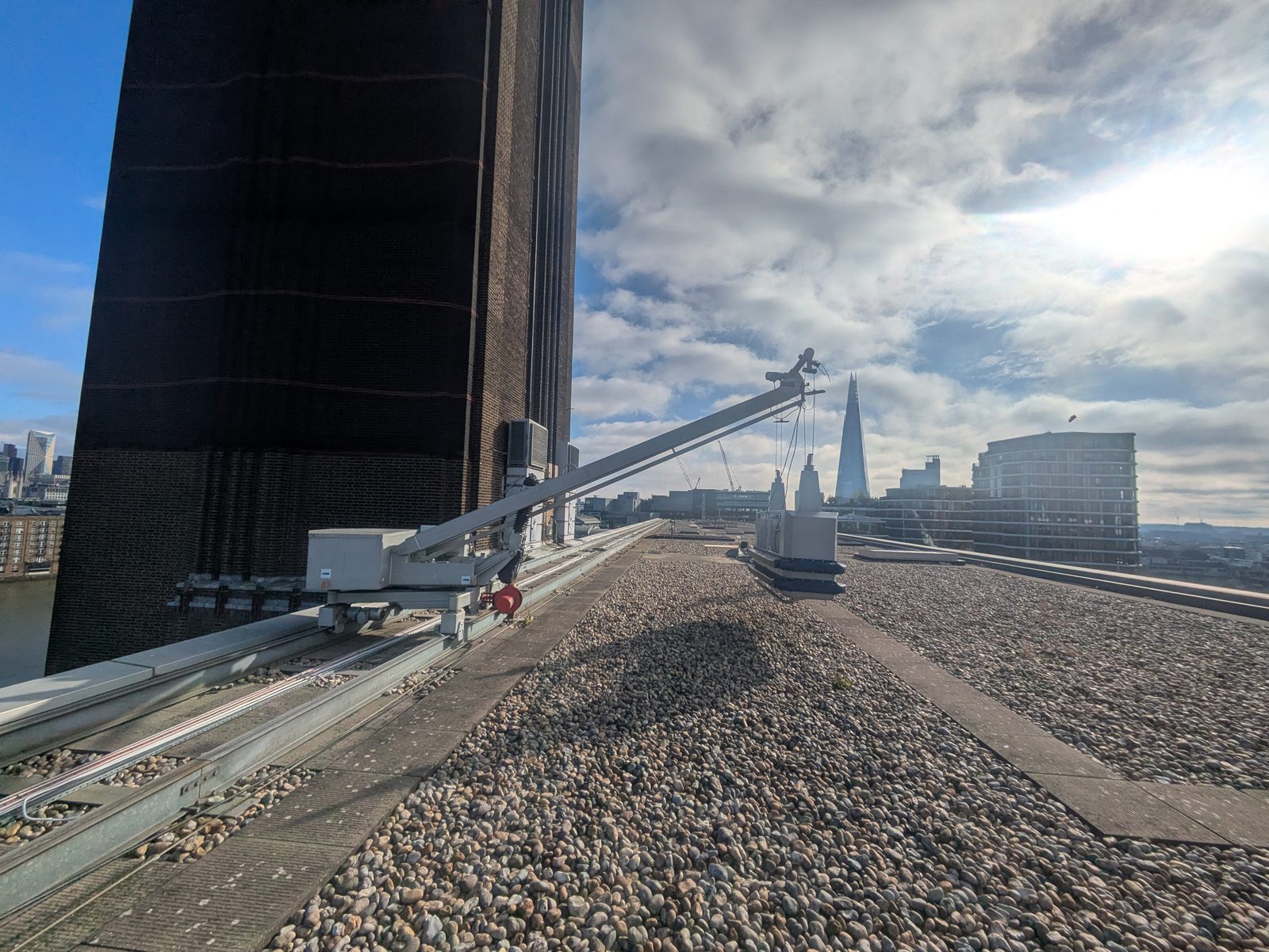 A BMU and its track on a London rooftop.